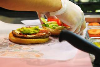 A California Whopper is assembled during the opening of the Burger King Whopper Bar Friday, April 8, 2011 in the Rio.
