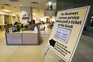 A sign directs people to a computer kiosk on the main floor of the City of Las Vegas Development Services Center, the hub of business licensing and permitting activity, at 333 N. Rancho Drive, Monday, March 5, 2012.