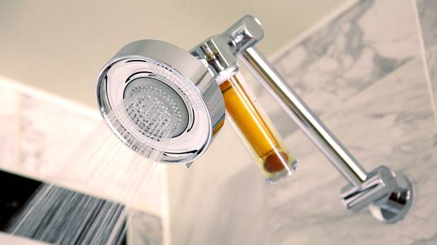A Vitamin C shower infuser in the "Stay Well" bathroom is said to neutralize chlorine to promote healthy hair and skin.