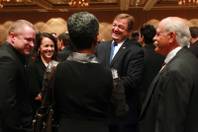 Sen. Dean Heller talks with guests at at the Nevada Development Authority's annual luncheon Friday, Dec. 7, 2012.