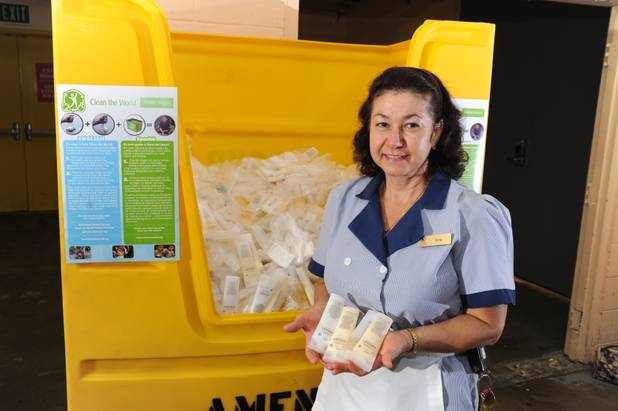 In support of the Clean the World nonprofit, Caesars Entertainment housekeepers such as Ana Rivera collect slightly used or unused shampoo.
