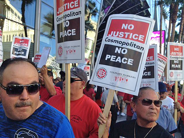 Workers picket outside Cosmopolitan over the lack of a union contract, Friday, June 14, 2013.