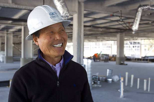 Steven Kwon, president of GKG Builders, gives a tour of the Peace Palace, a Unification Church convention and training center, under construction at 6590 Bermuda Road Monday, April 7, 2014.