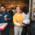 Las Vegas Dunkin Donuts employee Samantha Ashhadi  gives out samples of coffee to customers. 