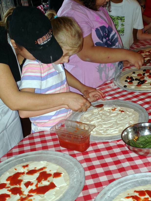 Grimaldi’s Pizzeria partnered with the Nevada Blind Children’s Foundation to conduct a pizza-making class for students suffering from visual impairments or blindness. Twelve students, ages 6 to 15, spent a morning learning the history of pizza, the layout of a restaurant and the steps it takes to make a pie.