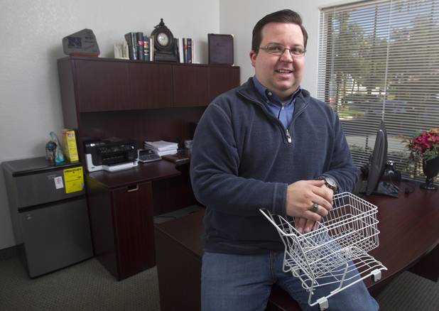 Bryan Wachter, lobbyist for the Retail Association of Nevada, poses in his office. Wachter says fewer stores are closing now than during the depths of the recession, but the economy still isn’t fully recovered.