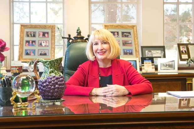 Deborah Danielson, owner of the Danielson Financial Group, poses in her office. Danielson was the first woman in Nevada to be certified as a fund specialist. She has been working in the investment industry since 1981. 