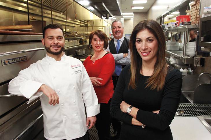 The Ferraro family works together at Ferraro’s Italian Restaurant and Lounge. From left are Mimmo, Rosalba, Gino and Theresa.