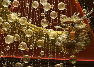 A detail of the crown jewel of the Lucky Dragon, a large golden dragon coiled above the casino floor is seen during a tour of the property on Saturday afternoon.
